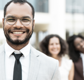 Smiling, confident leader who is successful in both personal and professional life